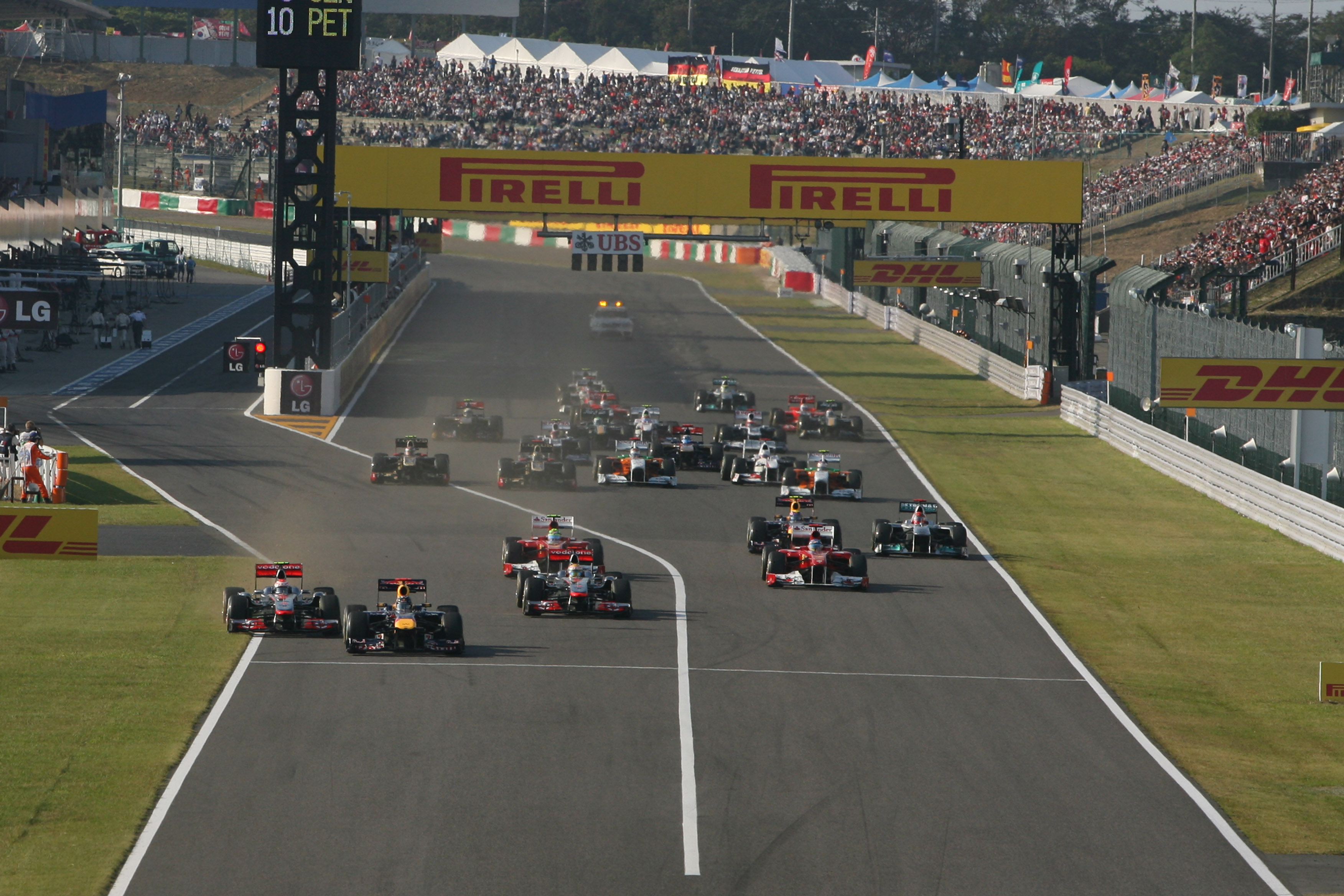 Race: Button en Vettel doen wat ze moeten doen