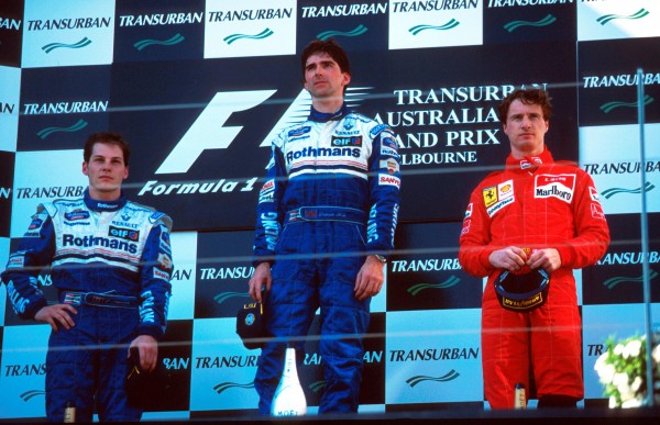 Podium L to R: Second placed Jacques Villeneuve (CDN) Williams, race winner Damon Hill(GBR) Williams and third placed Eddie Irvine (GBR) Ferrari. Australian Grand Prix, Melbourne, 10th March 1996