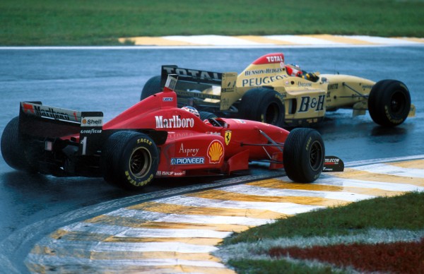 Rubens Barrichello(BRA) Jordan 196 battles with Michael Schumacher(foreground) Brazilian Grand Prix, Sao Paulo, Interlagos, 31st March 1996