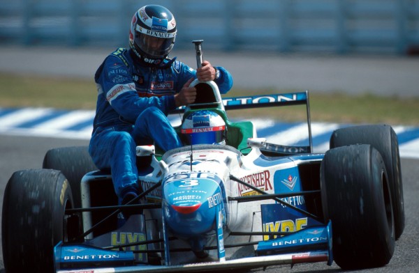 Gerhard Berger (AUS) Benetton B196 retired whilst leading two laps from the end with a massive engine failure. He was picked up and returned to the pits by team mate and fifth place finisher Jean Alesi (FRA). German Grand Prix, Hockenheim, 28 July 1996.
