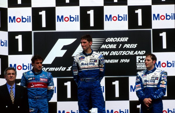 (L-R): Jean Alesi (FRA) Benetton 2nd, race winner Damon Hill (GBR) Williams and Jacques Villeneuve (CDN) Williams 3rd on the podium. Formula One World Championship, German Grand Prix, Hockenheim, Germany, 28 July 1996.