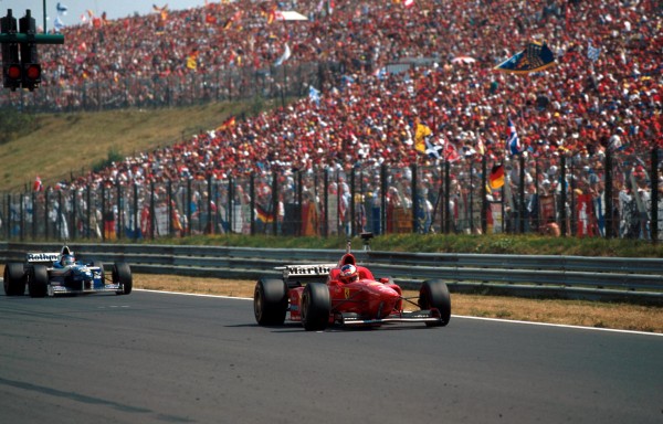 Michael Schumacher(GER) Ferrari F310 gets pole position in front of another huge crowd Hungarian Grand Prix, Hungaroring, 11th August 1996