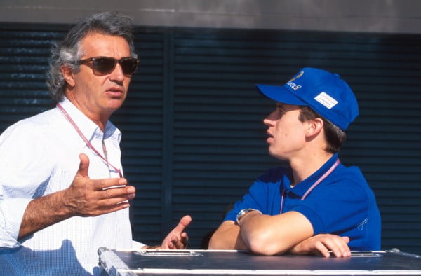 Flavio Briatore(ITA) Benetton F1 Boss and Ligier driver Olivier Panis, right Japanese Grand Prix, Suzuka, 29th October 1995