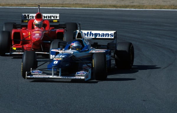 Jacques Villeneuve(CDN) Williams FW18 makes a move on Irvine at the chicane and gets it all wrong Japanese Grand Prix, Suzuka, 13th October 1996