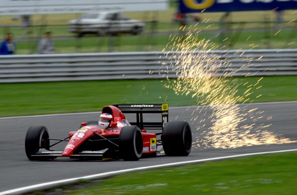 The sparks fly from the back of the Ferrari of Jean Alesi (FRA). British Grand Prix, Silverstone, England, 14 July 1991.