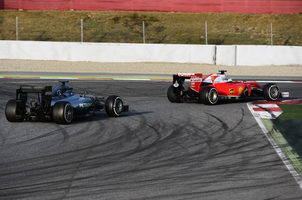 Sebastian Vettel (GER) Ferrari SF16-H and Nico Rosberg (GER) Mercedes-Benz F1 W07 Hybrid at Formula One Testing, Day Two, Barcelona, Spain, Tuesday 23 February 2016.
