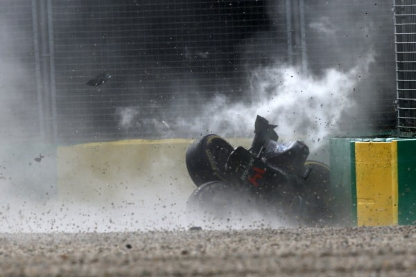 www.sutton-images.com Fernando Alonso (ESP) McLaren MP4-31 crashes out of the race at Formula One World Championship, Rd1, Australian Grand Prix, Race, Albert Park, Melbourne, Australia, Sunday 20 March 2016.