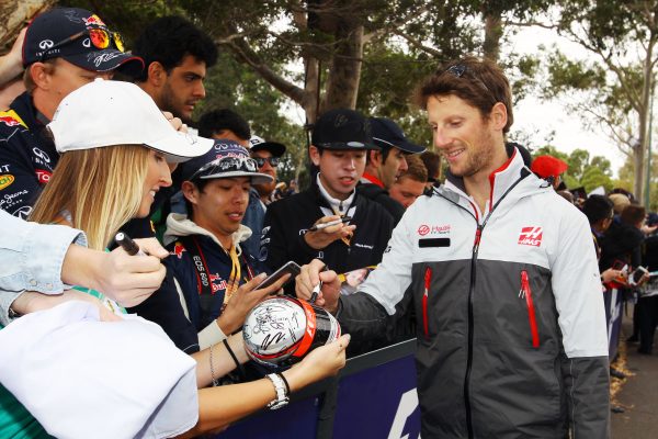 Formula One World Championship 2016, Round 1, Australian Grand Prix, Melbourne, Australia, Saturday 19 March 2016 - Romain Grosjean (FRA) Haas F1 Team signs autographs for the fans.