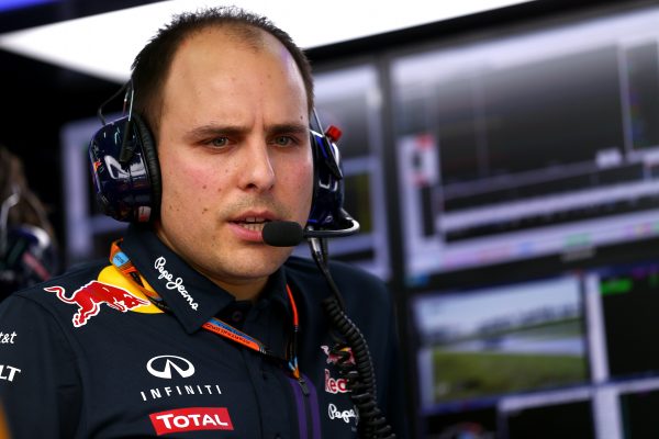 KUALA LUMPUR, MALAYSIA - MARCH 27: Daniil Kvyat of Russia and Infiniti Red Bull Racing's race engineer Gianpiero Lambiase works in the garage during practice for the Malaysia Formula One Grand Prix at Sepang Circuit on March 27, 2015 in Kuala Lumpur, Malaysia. (Photo by Dan Istitene/Getty Images)