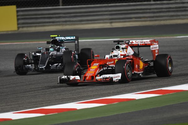 www.sutton-images.com Sebastian Vettel (GER) Ferrari SF16-H and Nico Rosberg (GER) Mercedes-Benz F1 W07 Hybrid at Formula One World Championship, Rd2, Bahrain Grand Prix Practice, Bahrain International Circuit, Sakhir, Bahrain, Friday 1 April 2016.