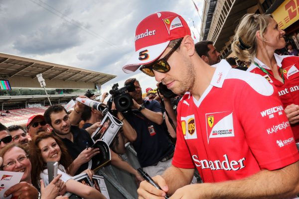 Formula One World Championship 2016, Round 5, Spanish Grand Prix, Barcelona, Spain, Thursday 12 May 2016 - Sebastian Vettel (GER) Ferrari signs autographs for the fans.