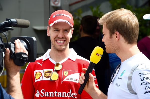 www.sutton-images.com Sebastian Vettel (GER) Ferrari and Nico Rosberg (GER) Mercedes AMG F1 at Formula One World Championship, Rd5, Spanish Grand Prix, Preparations, Barcelona, Spain, Thursday 12 May 2016.