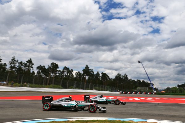 Formula One World Championship 2016, Round 12, German Grand Prix, Hockenheim, Germany, Friday 29 July 2016 - Nico Rosberg (GER) Mercedes AMG F1 W07 Hybrid passes team mate Lewis Hamilton (GBR) Mercedes AMG F1 W07 Hybrid.