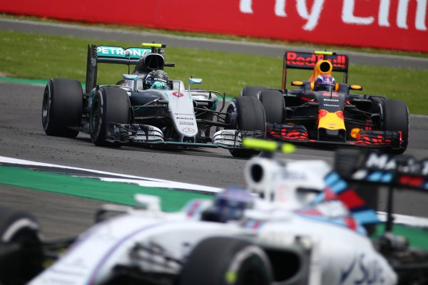Formula One World Championship 2016, Round 10, British Grand Prix, Silverstone, England, Sunday 10 July 2016 - Nico Rosberg (GER) Mercedes AMG Petronas F1 W07 and Max Verstappen (NLD) Red Bull Racing RB12.