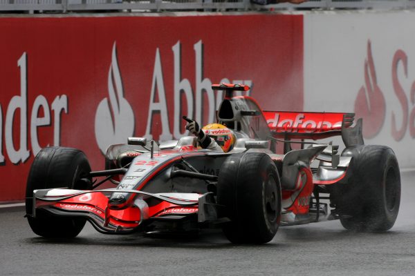 Race winner Lewis Hamilton (GBR) McLaren Mercedes MP4/23 crosses the line to win. Formula One World Championship, Rd 9, British Grand Prix, Race, Silverstone, England, Sunday 6 July 2008.