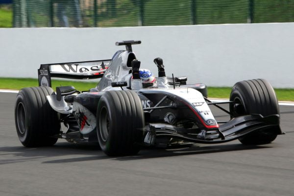 Race winner Kimi Raikkonen (FIN) McLaren Mercedes MP4/19B celebrates at the end of the race. Formula One World Championship, Rd14, Belgian Grand Prix, Race Day, Spa Francorchamps, Belgium, 29 August 2004. DIGITAL IMAGE BEST IMAGE