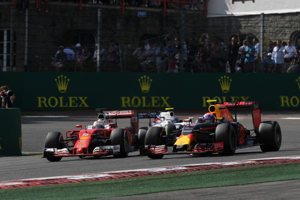 www.sutton-images.com Sebastian Vettel (GER) Ferrari SF16-H and Max Verstappen (NED) Red Bull Racing RB12 battle at Formula One World Championship, Rd13, Belgian Grand Prix, Race, Spa Francorchamps, Belgium, Sunday 28 August 2016.