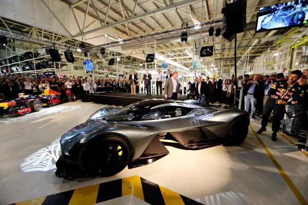 GAYDON, ENGLAND - JULY 05: Daniel Ricciardo of Australia and Red Bull Racing inspects the AM-RB 001 at the Aston Martin and Red Bull Racing Project AMRB 001 Unveil on July 5, 2016 at the Aston Martin Headquarters in Gaydon, England on July 5, 2016 in Gaydon, England. (Photo by Mark Thompson/Getty Images)