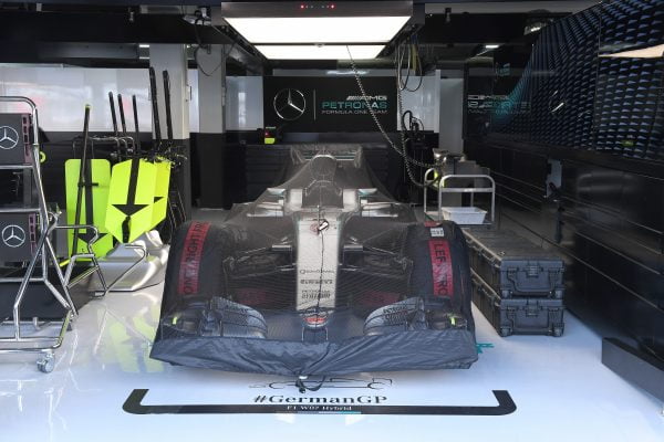 www.sutton-images.com Mercedes-Benz F1 W07 Hybrid under covers in the garage at Formula One World Championship, Rd12, German Grand Prix, Race, Hockenheim, Germany, Sunday 31 July 2016.